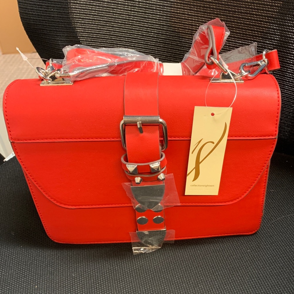 Flap bucket crossbody top handle bag